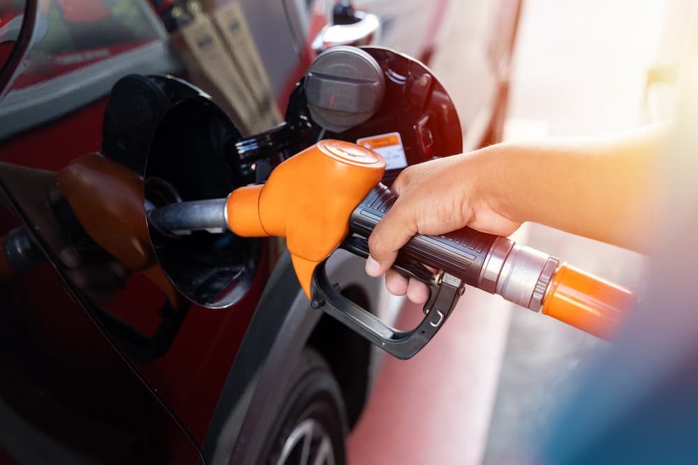 putting gas in the car