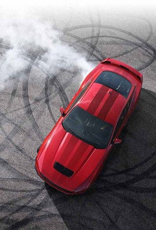 Overhead view of a 2024 Ford Mustang® model with tire tracks on pavement | Visalia Ford in Visalia CA