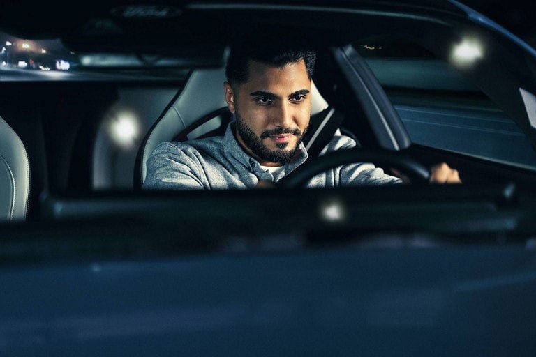 Person sitting in the driver’s seat of a parked 2024 Ford Mustang® coupe | Visalia Ford in Visalia CA